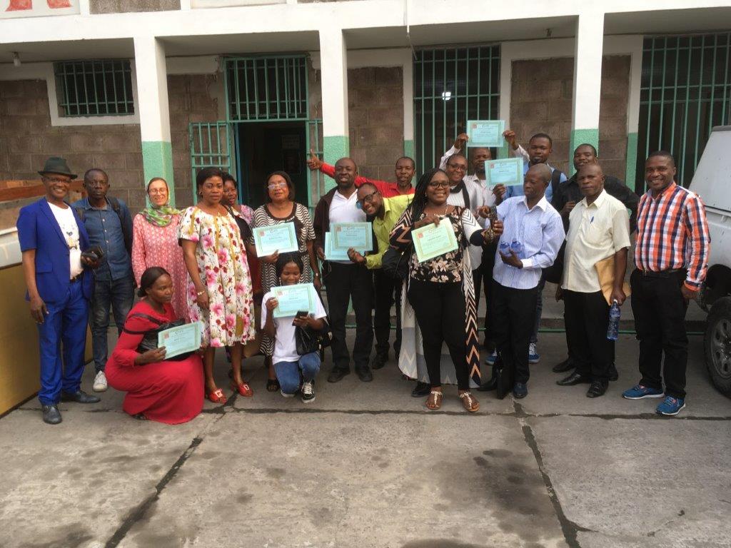 Group photo with certificates